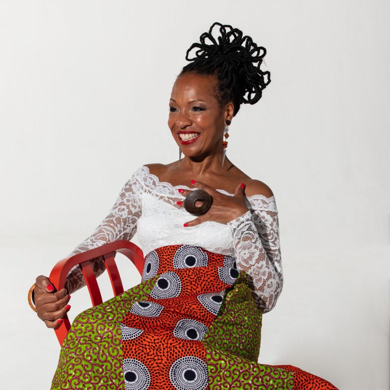 Lisa Simone wearing a beautiful dress